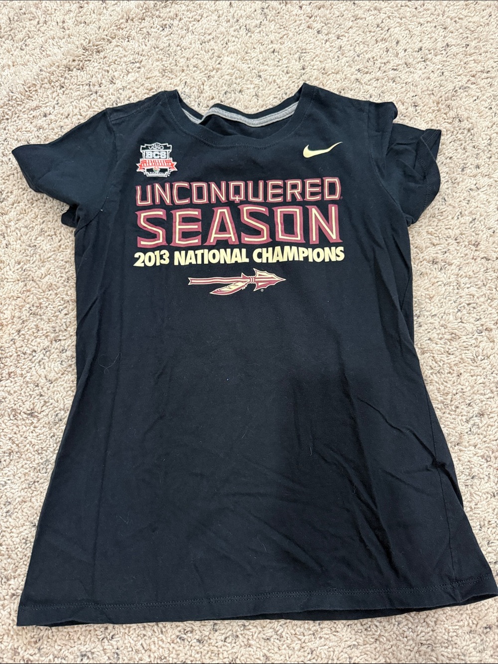 Nike Black 'Unconquered Season' Graphic Tee with Red and Yellow Accents